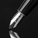 A close-up of the tip of the Adonit Star stylus, highlighting its ultra-fine one-millimeter tip on the end.